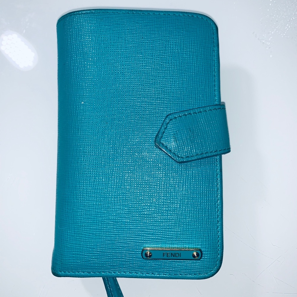 Authentic turquoise bifold FENDI wallet.